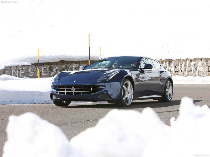 Blue Ferrari FF on snowy road