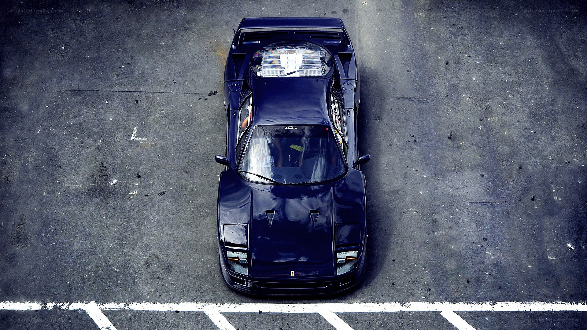 blue ferrari from above