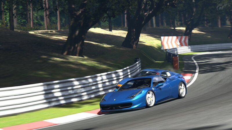 Blue Ferrari on a racetrack