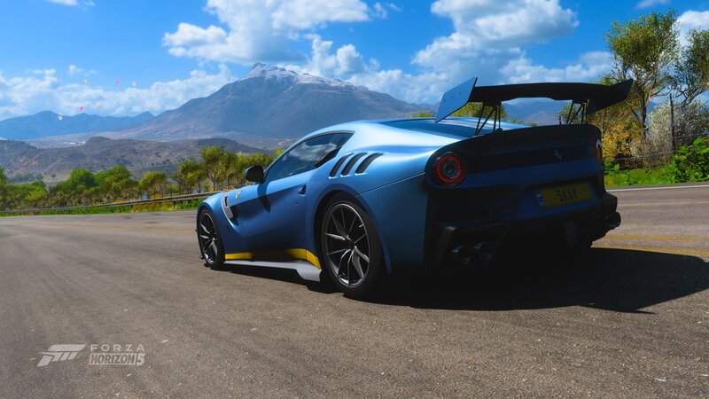 Blue Ferrari on Road — Serene