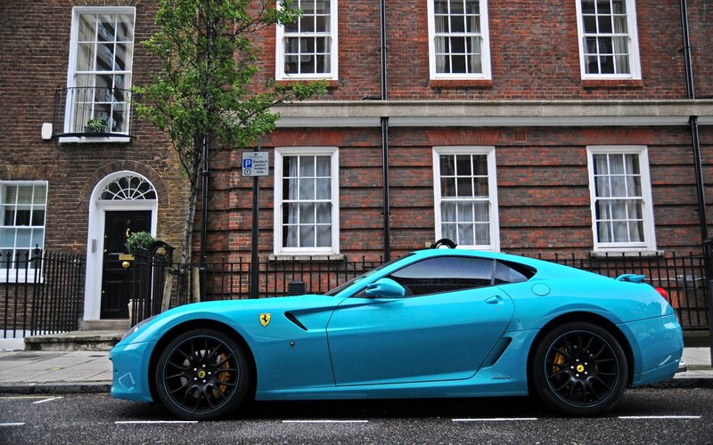 Blue Ferrari Sports Car — Cyan