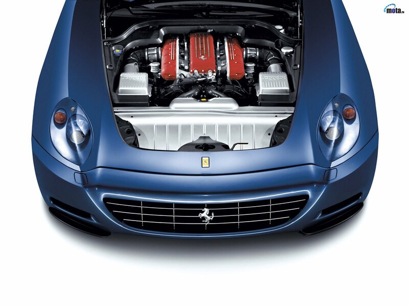 Blue Ferrari with open hood