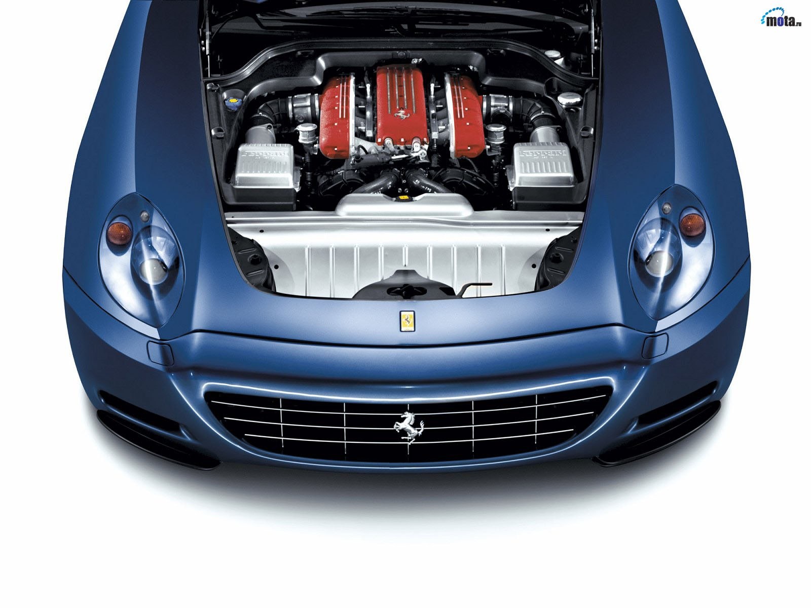 Blue Ferrari with open hood