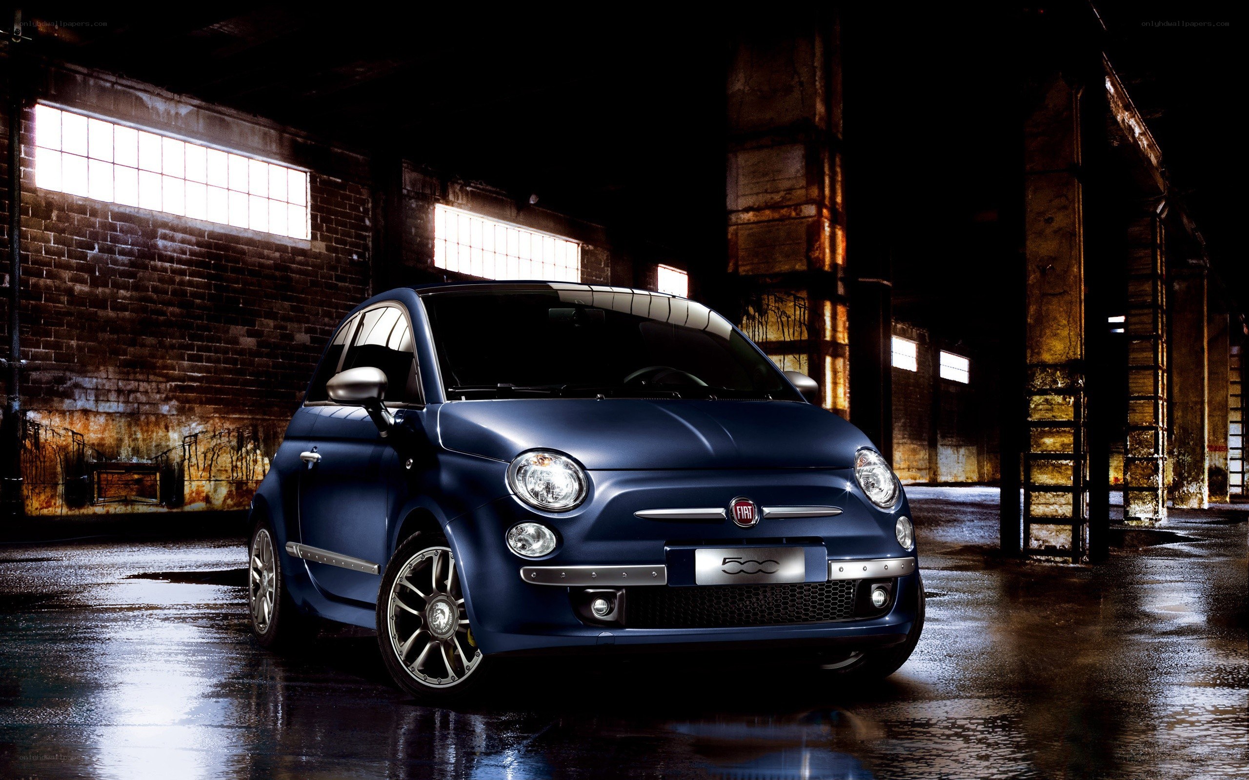 Blue Fiat 500 in warehouse
