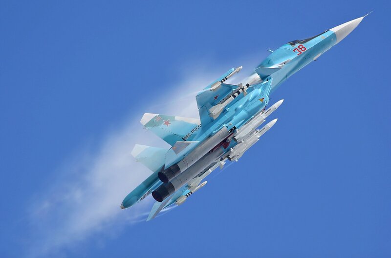 Blue Fighter Jet — Dramatic, Afternoon, Photograph, Missiles