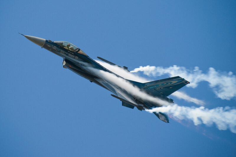 Blue Fighter Jet — Dynamic, Afternoon, Photograph