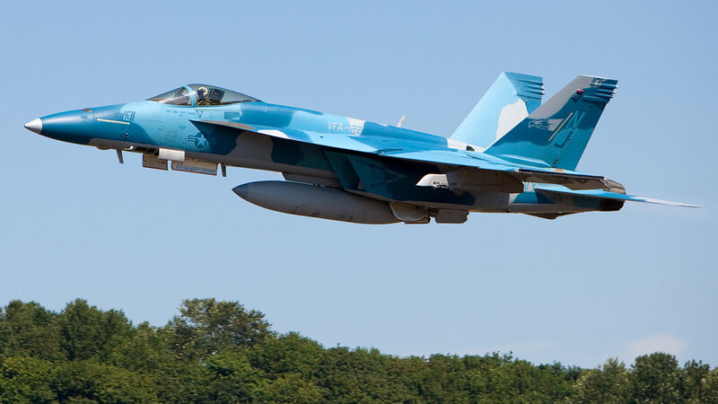 Blue Fighter Jet — Dynamic, Afternoon, Photograph, Trees