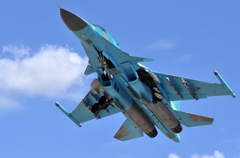 Blue Fighter Jet — Dynamic, Afternoon, Photograph, Wings