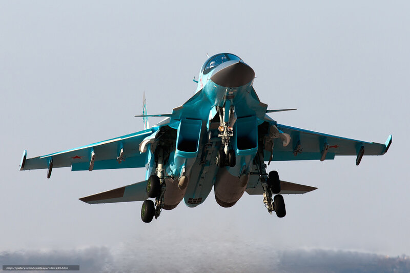 Blue fighter jet in flight