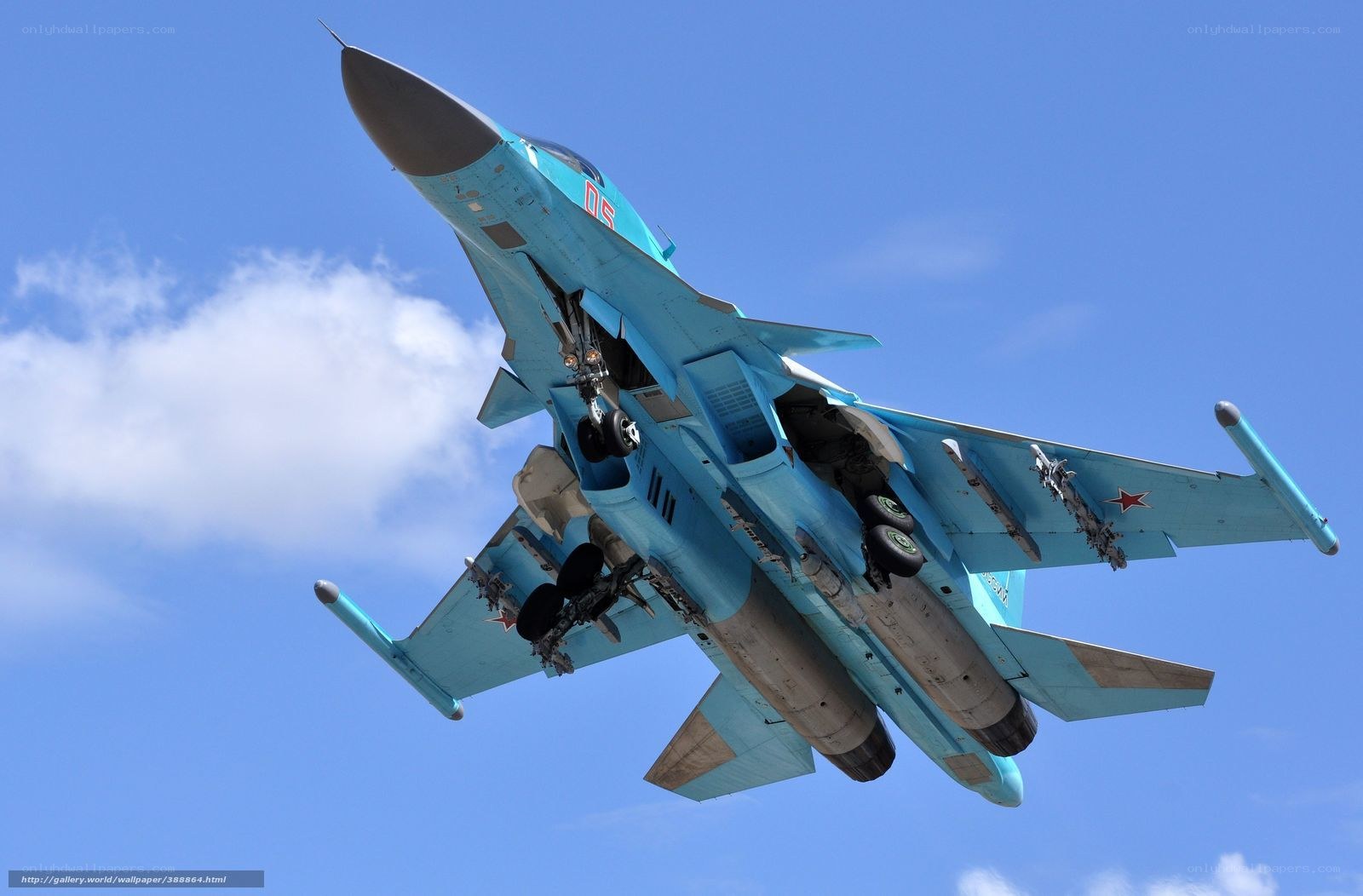Blue fighter jet in flight