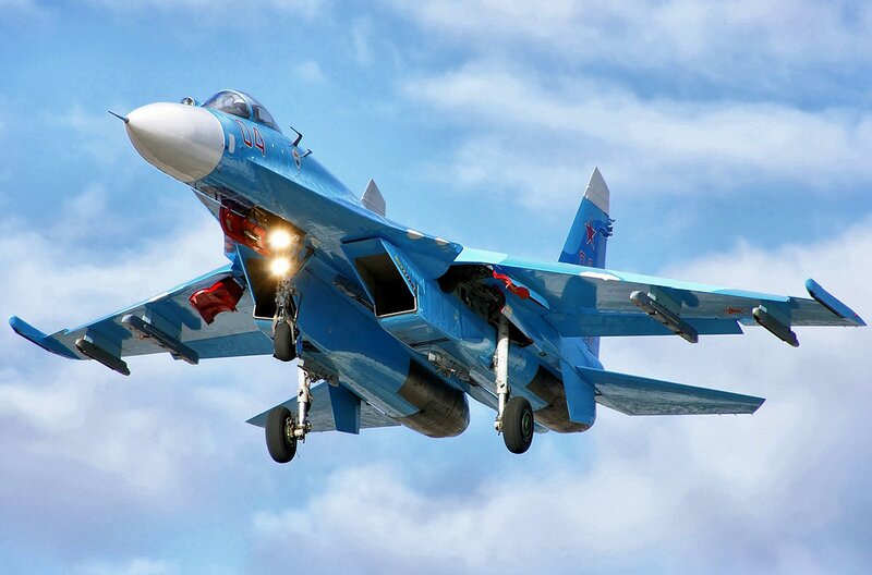 Blue Fighter Jet in Flight — Dynamic