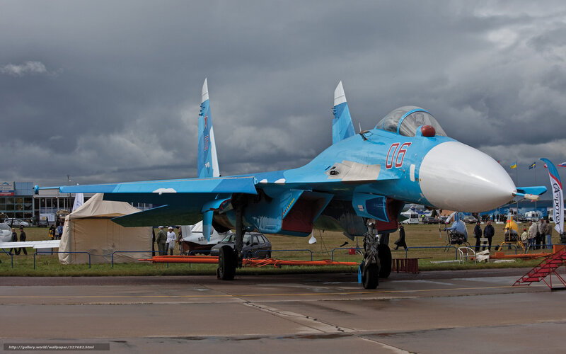 Blue fighter jet on display