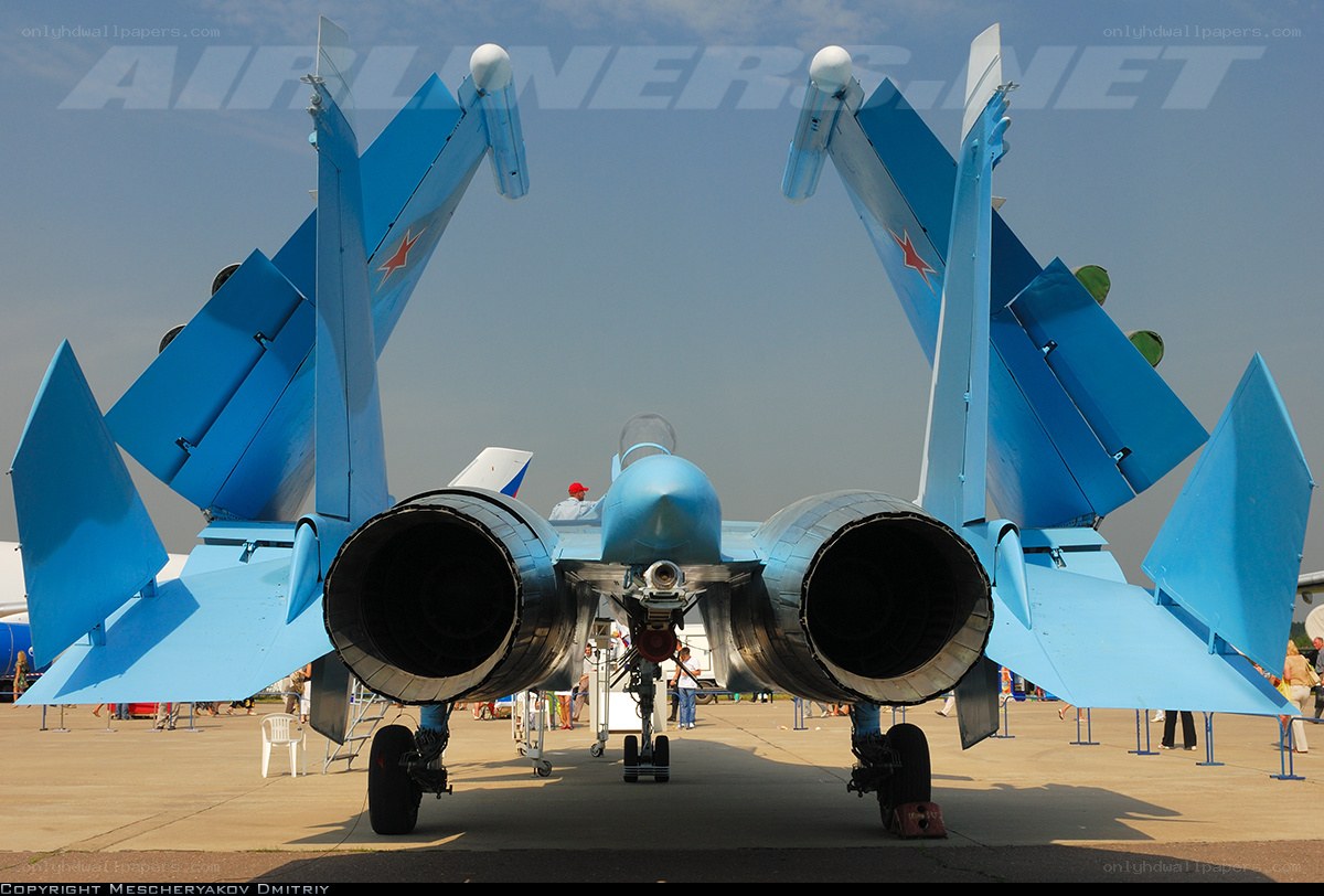 Blue fighter jet on display