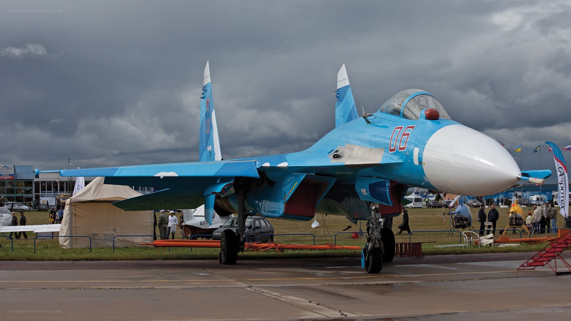 Blue fighter jet on display