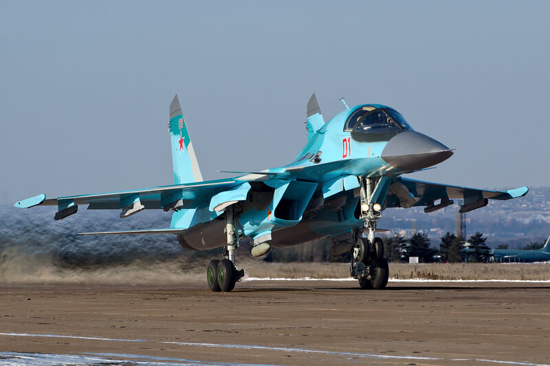 Blue Fighter Jet on Runway — Dynamic, Winter