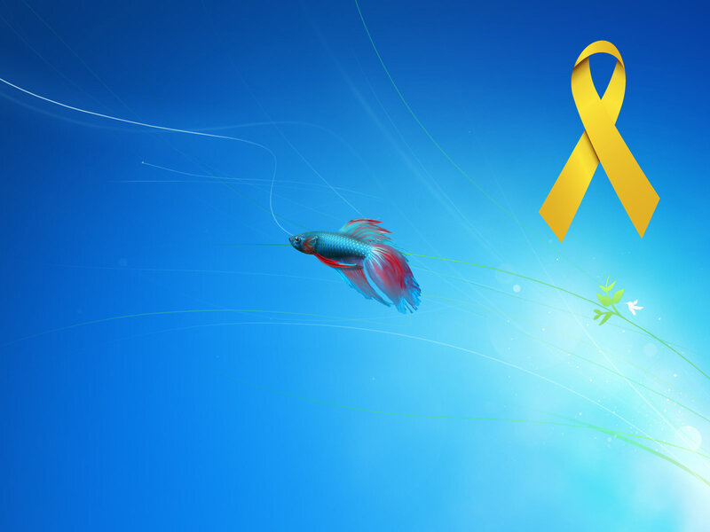 Blue fish with yellow ribbon