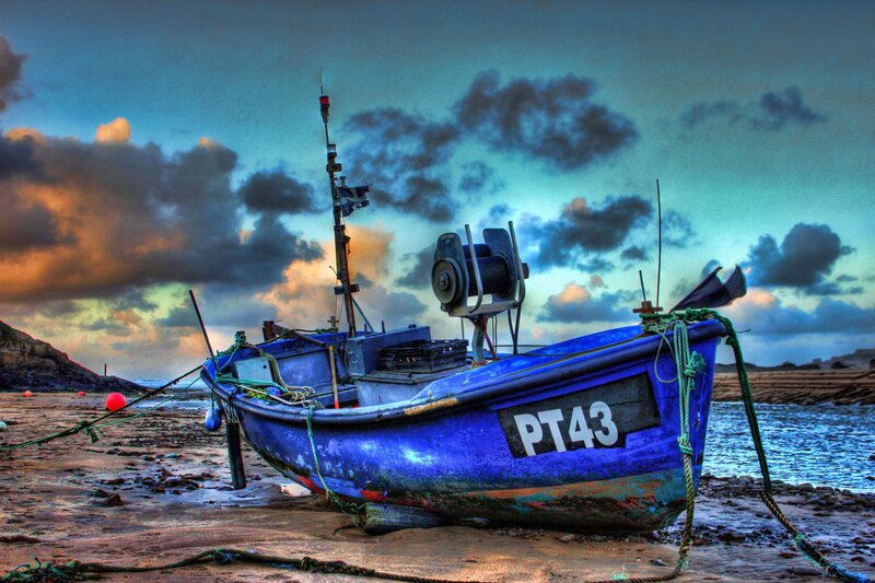 Blue Fishing Boat — Dramatic, Sunset