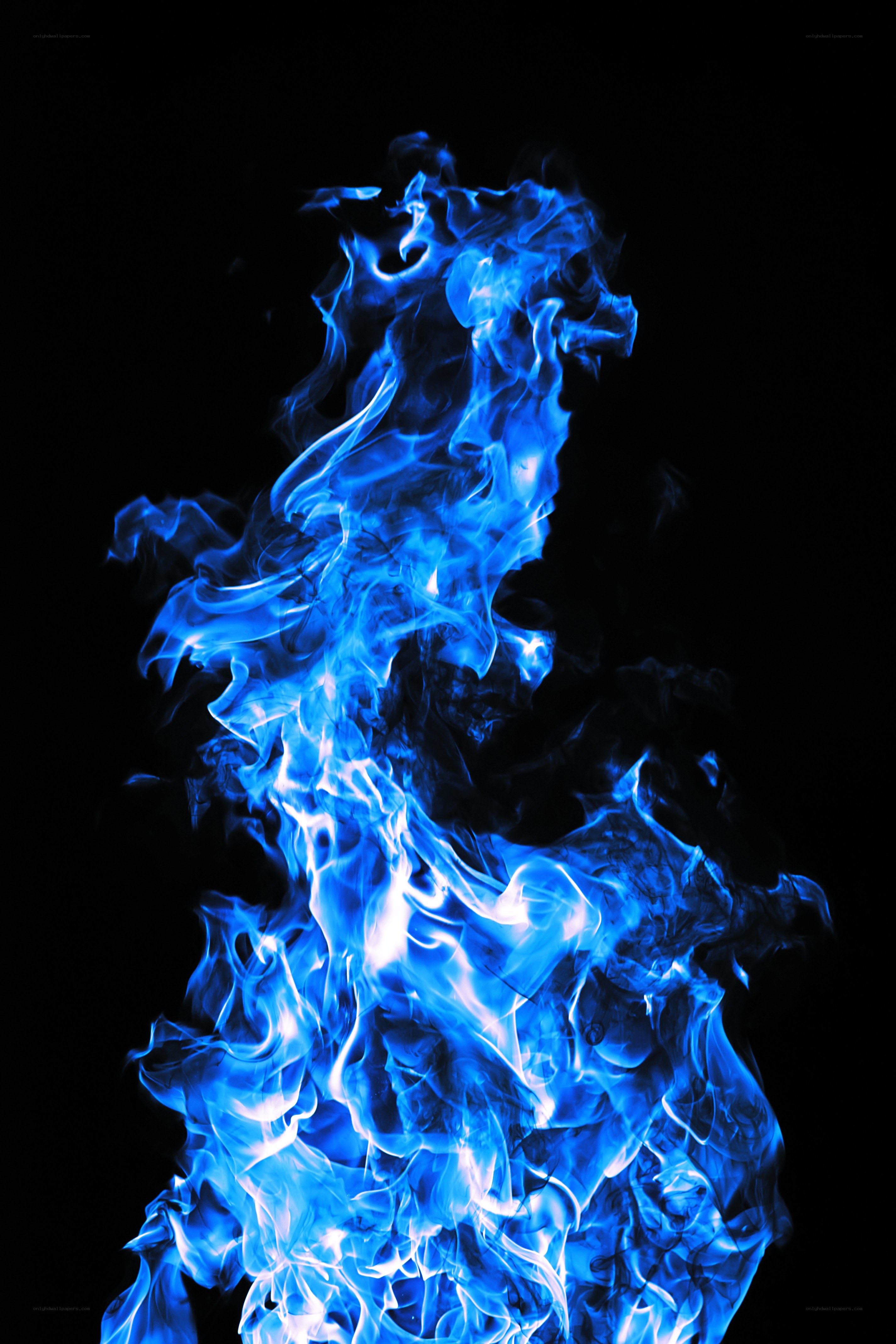 blue flame against black background