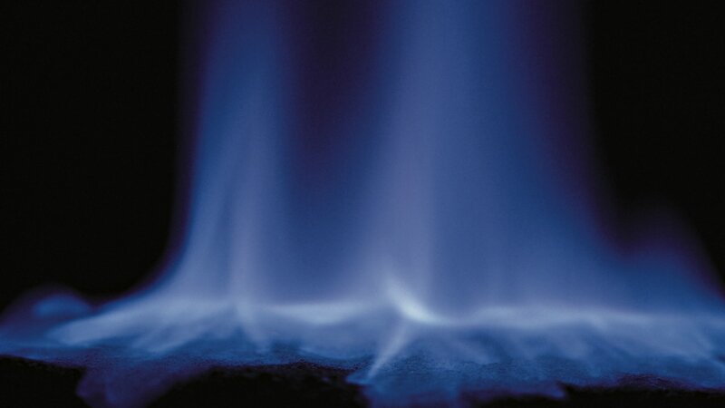 blue flame on dark background