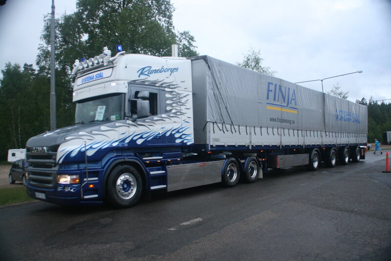 Blue flame truck on road