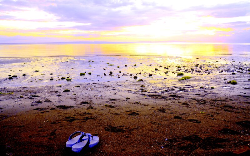 Blue Flip-flops on Beach — Yellow