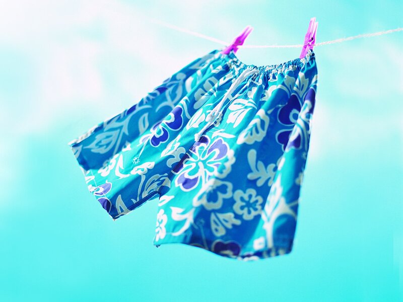 blue floral shorts on clothesline