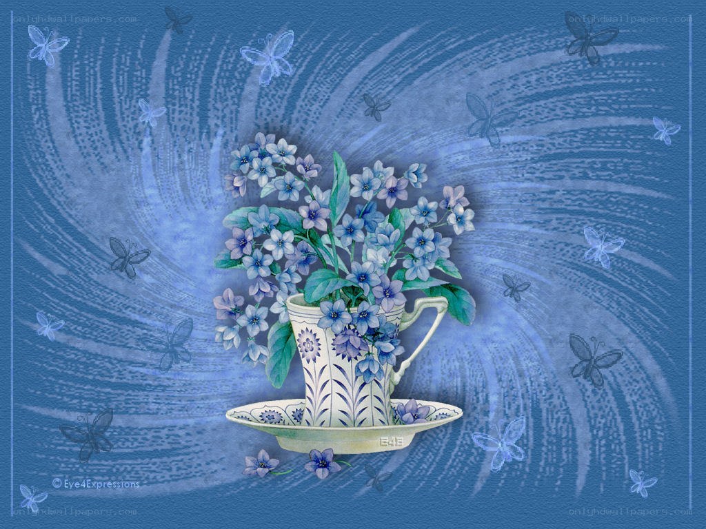 Blue flowers in a teacup