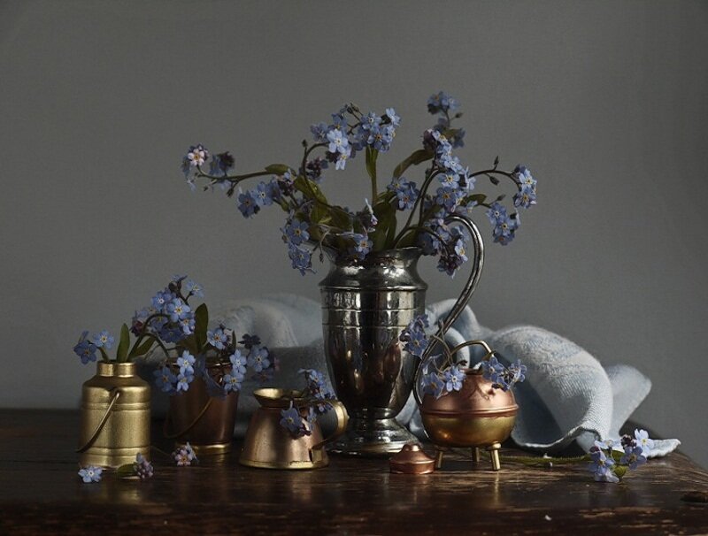 Blue Flowers in Metal Vases