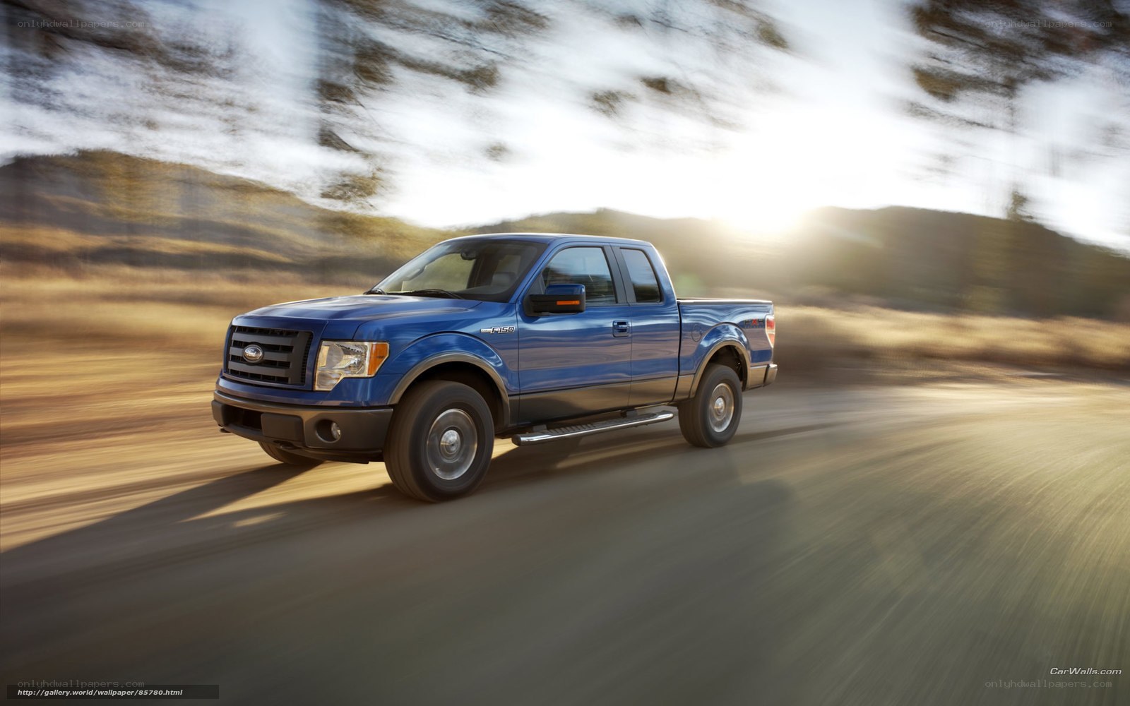 Blue Ford F-150 in motion