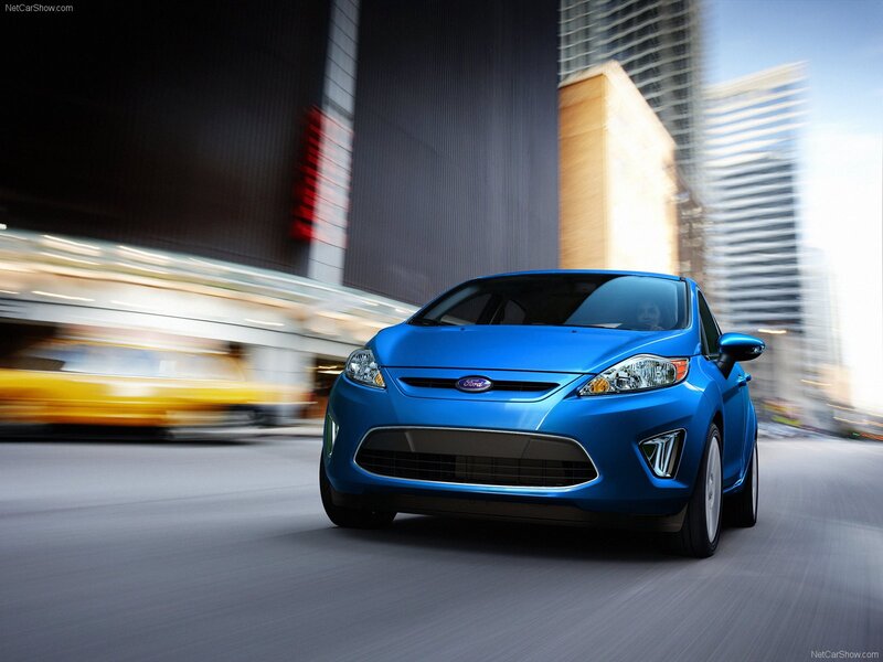 Blue Ford Fiesta in city