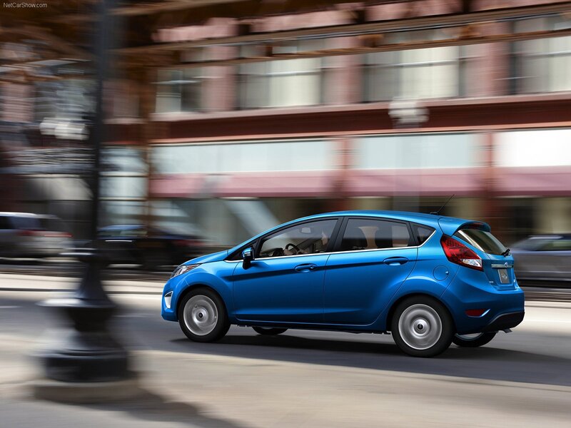 Blue Ford Fiesta in city