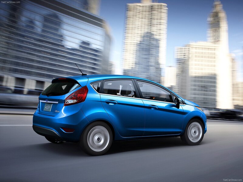 Blue Ford Fiesta in city