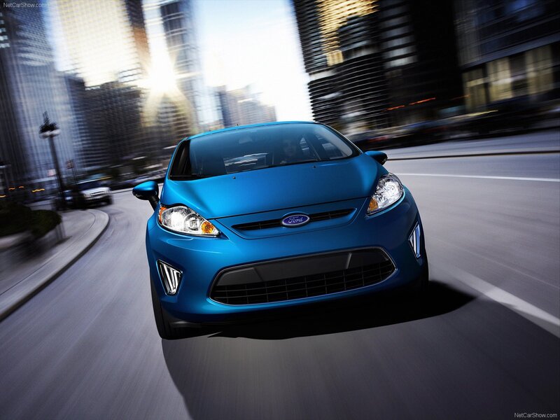 blue ford fiesta in city