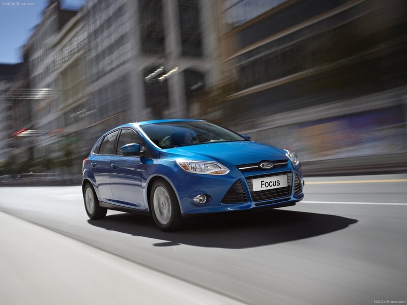 Blue Ford Focus in motion