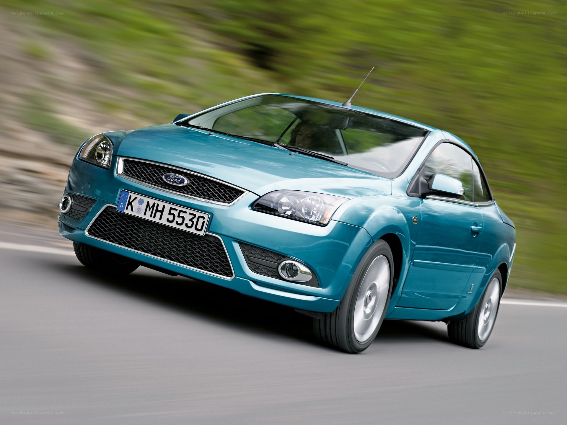 blue ford focus in motion