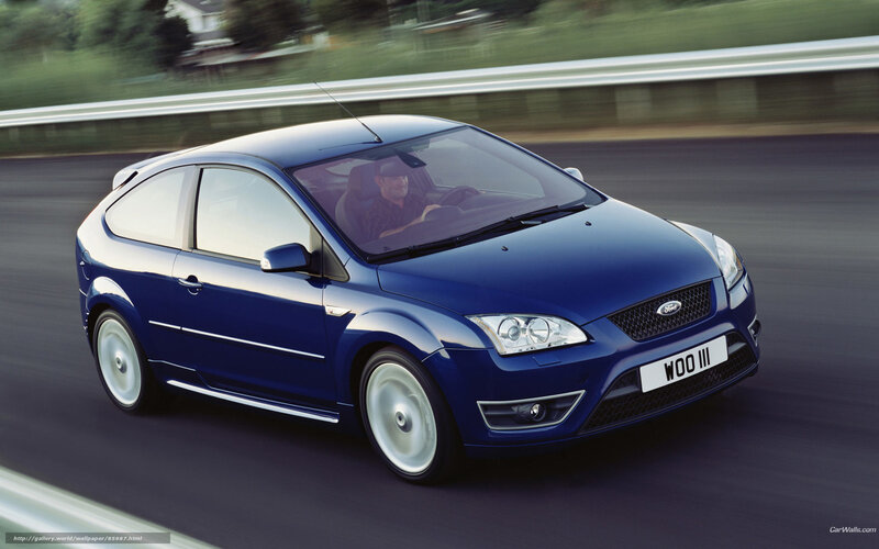 Blue Ford Focus in motion