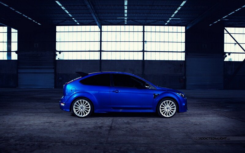 Blue Ford Focus in warehouse