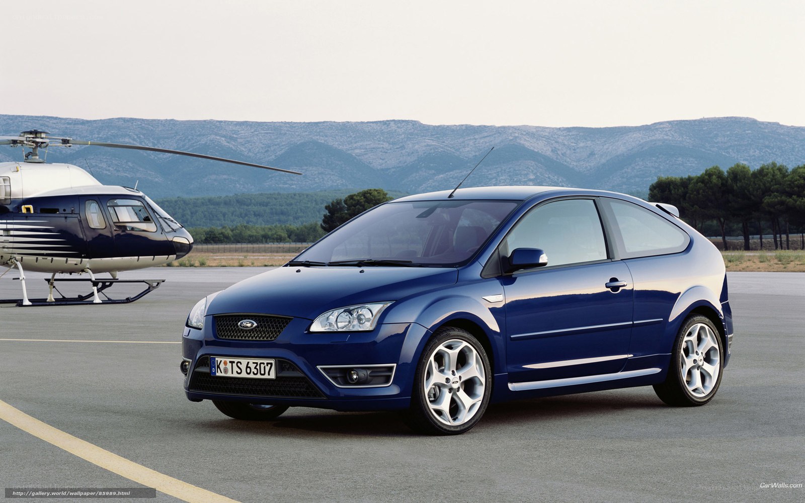 Blue Ford Focus on tarmac