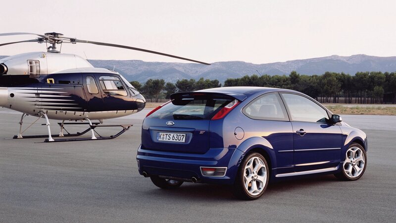 Blue Ford Focus ST with helicopter