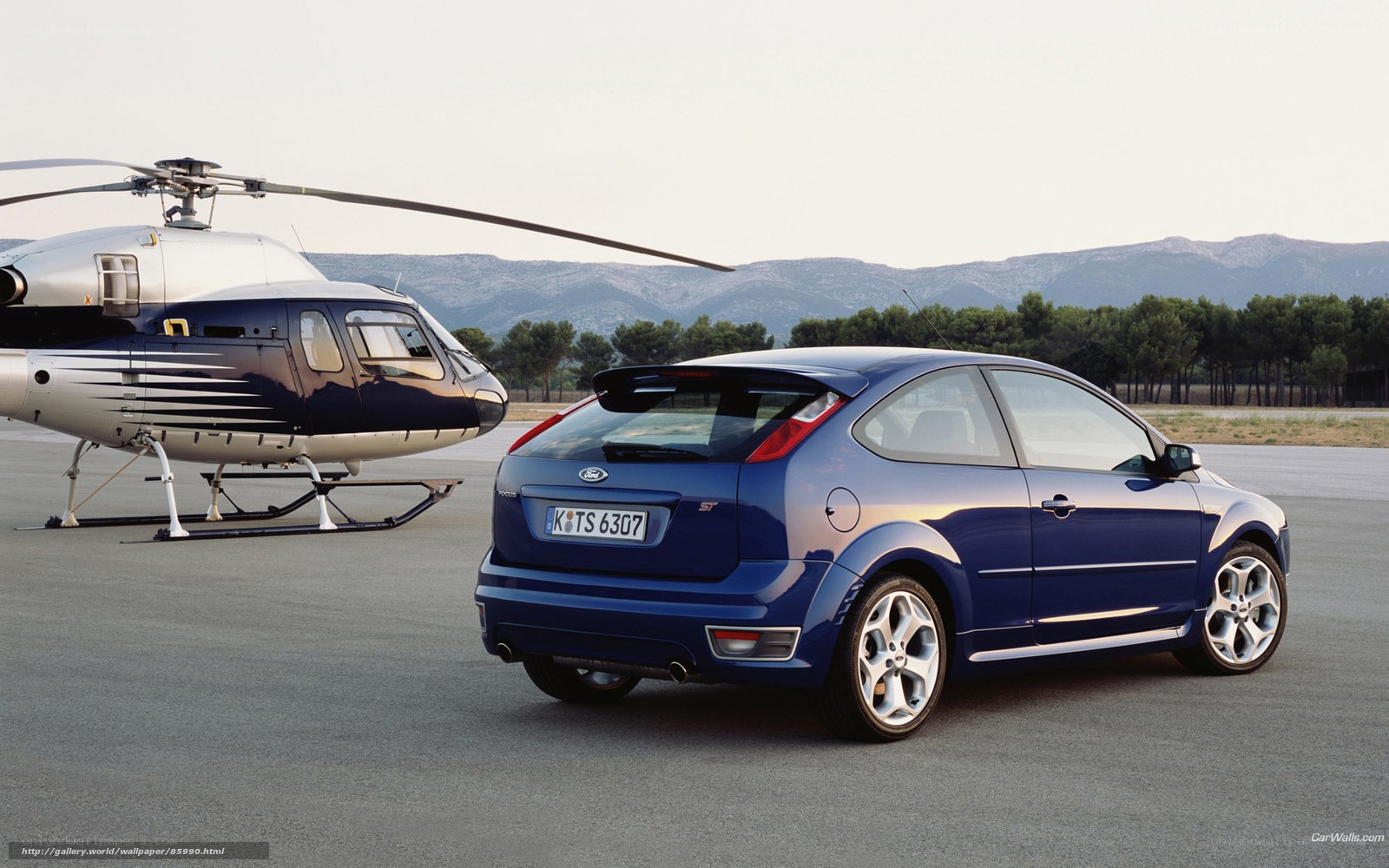 Blue Ford Focus ST with helicopter
