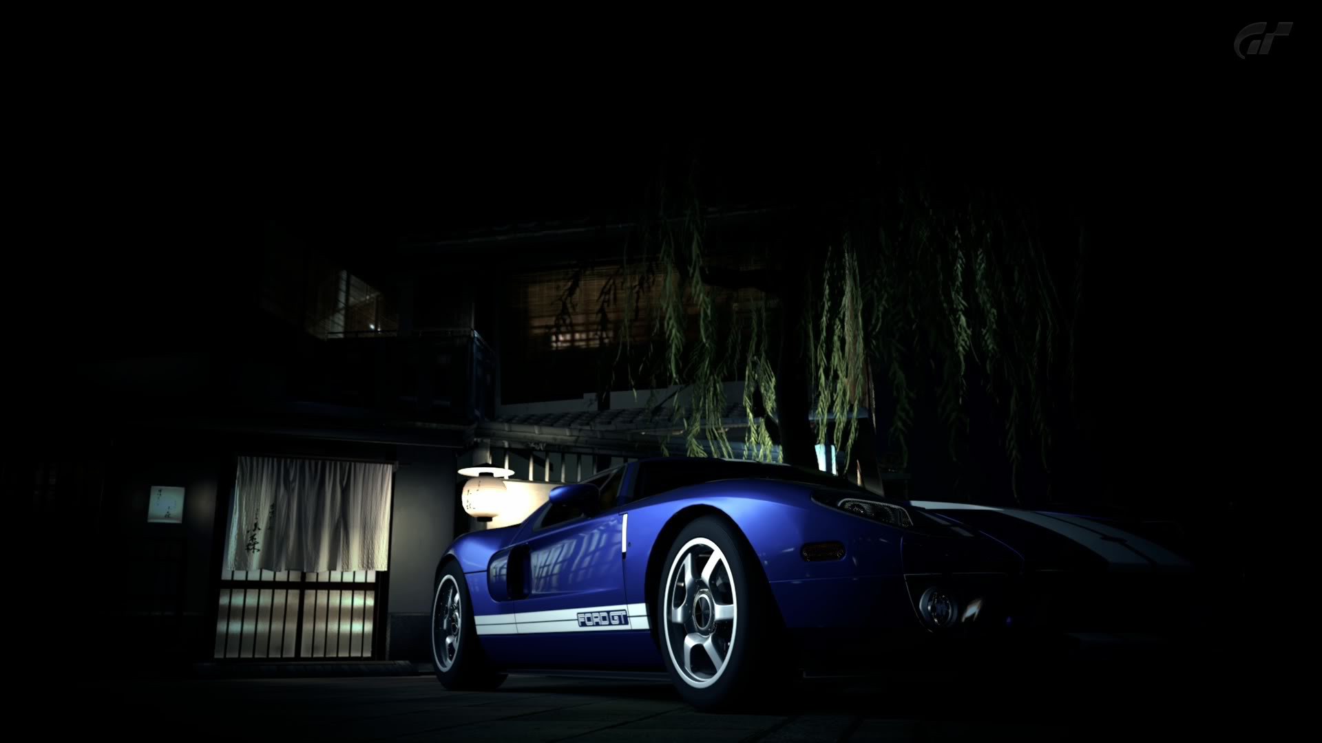 Blue Ford GT at night