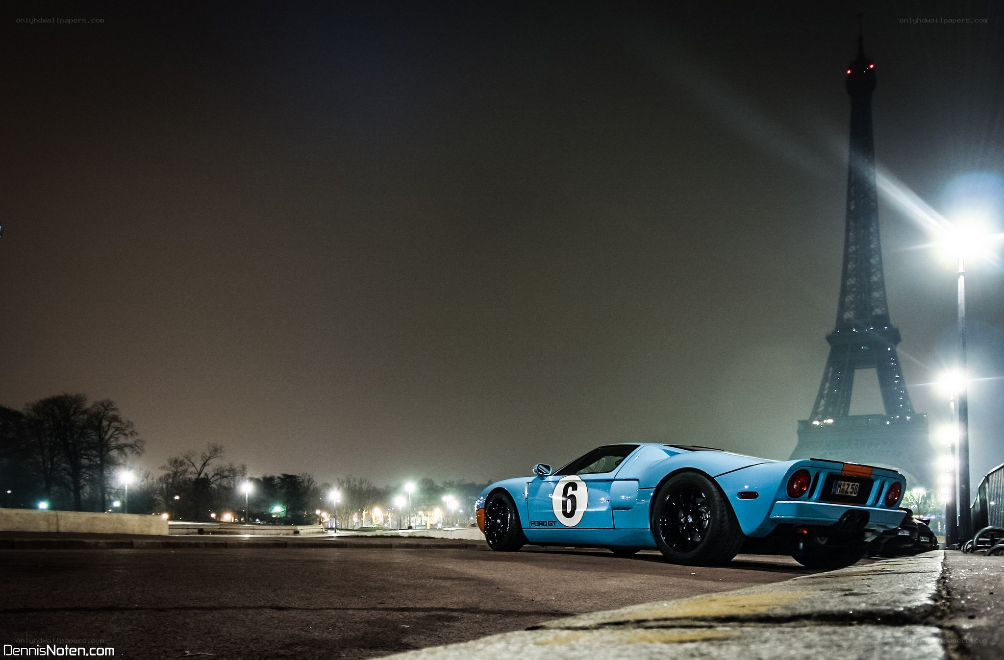 Blue Ford GT near Eiffel Tower
