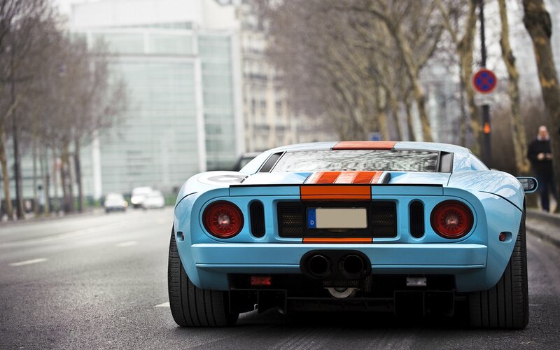 Blue Ford GT on city street