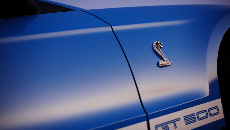 Blue Ford GT500 with Cobra emblem