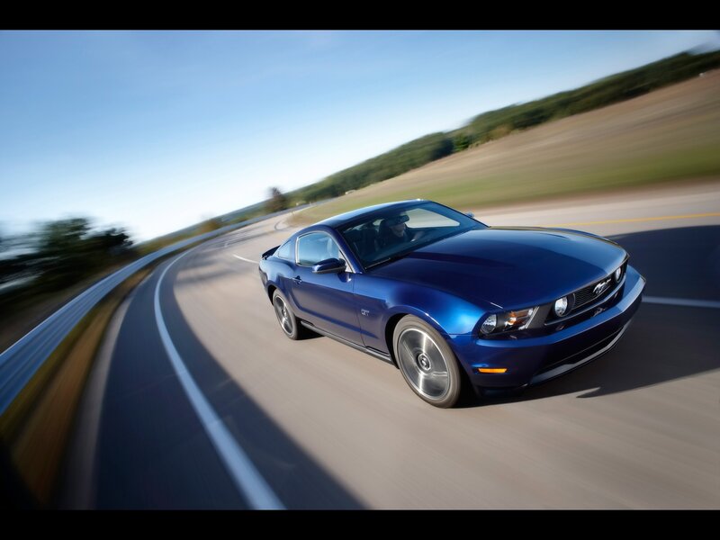 Blue Ford Mustang GT in motion