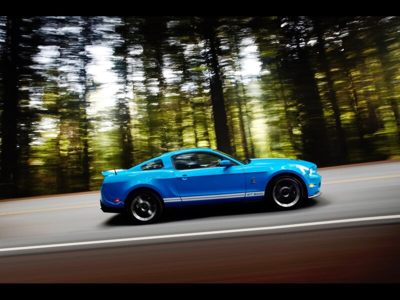 Blue Ford Mustang GT in motion