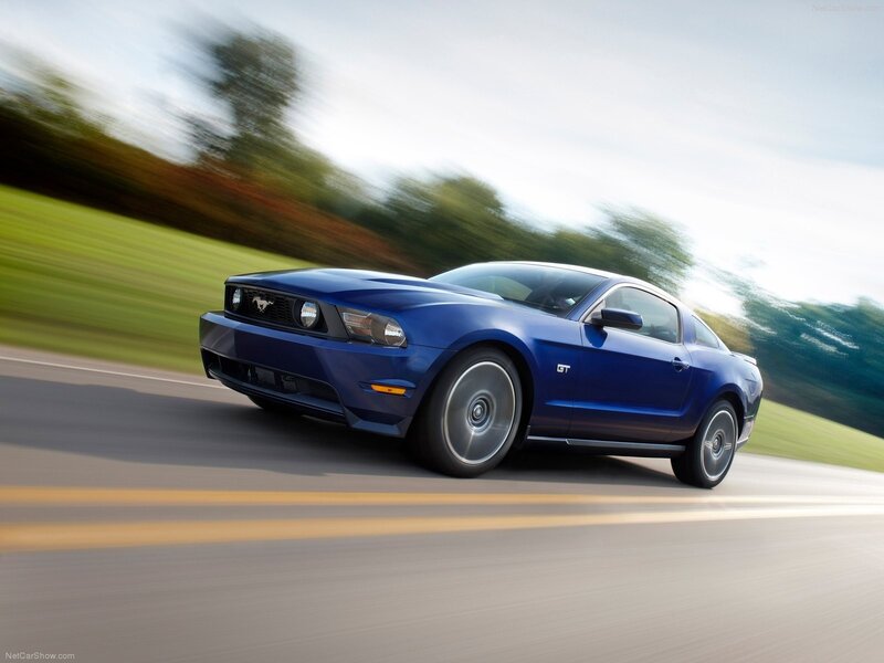 Blue Ford Mustang GT in motion