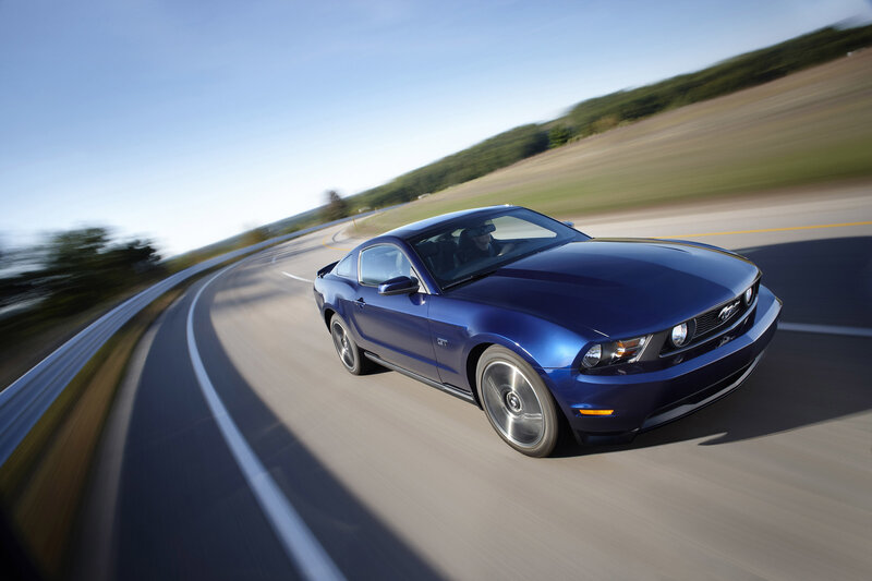 Blue Ford Mustang GT in motion