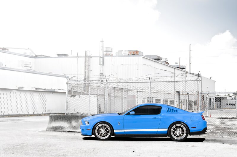 Blue Ford Mustang GT parked