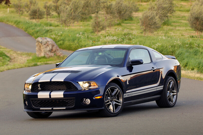 Blue Ford Mustang GT500 on road